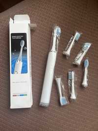 Електрична  зубна  щітка