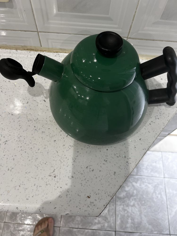 Chaleira de aquecer no fogao