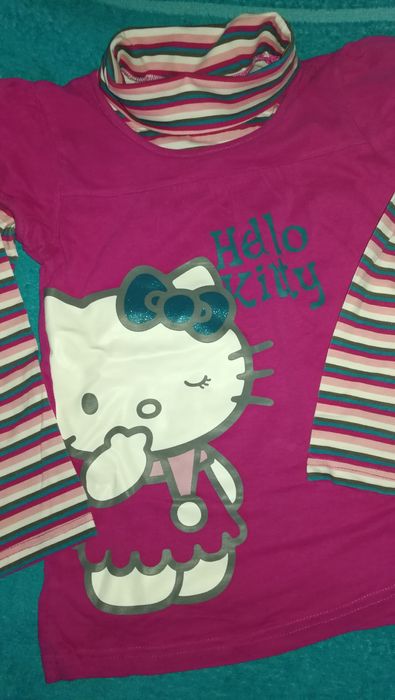 MIMOSAS l 2 Blusas Hello Kitty + Boneca Sfera Manga comprida 6-8Anos