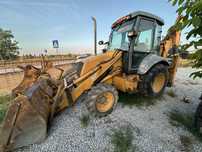 Retroescavadora new holland nh85