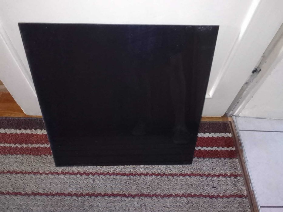 Płytki czarne z połyskiem ceramiczne . 60x60  .