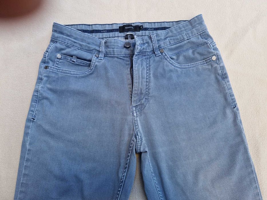 Spodnie chłopięce RESERVED rozm. 31