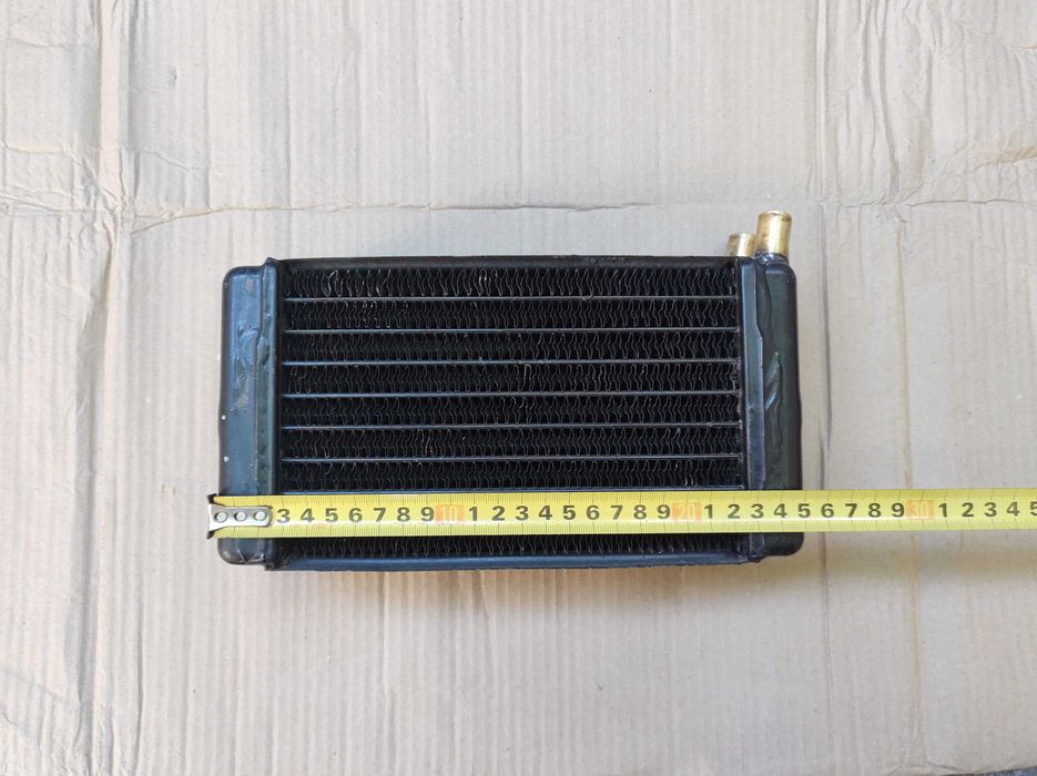 Радиатор печки, крыльчатка помпы, фиксатор рычага КПП