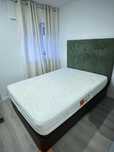 Cama de casal com arrumacao