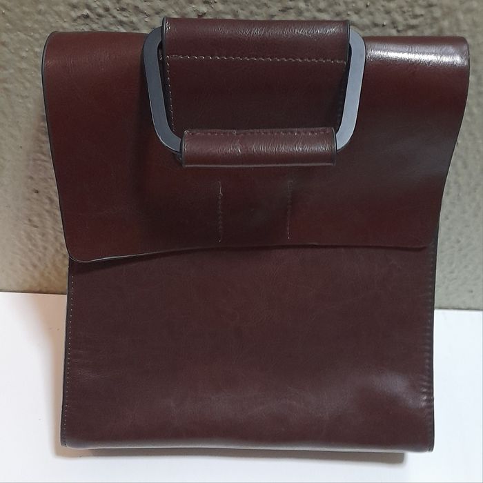Bolsa utilitária e mala em pele