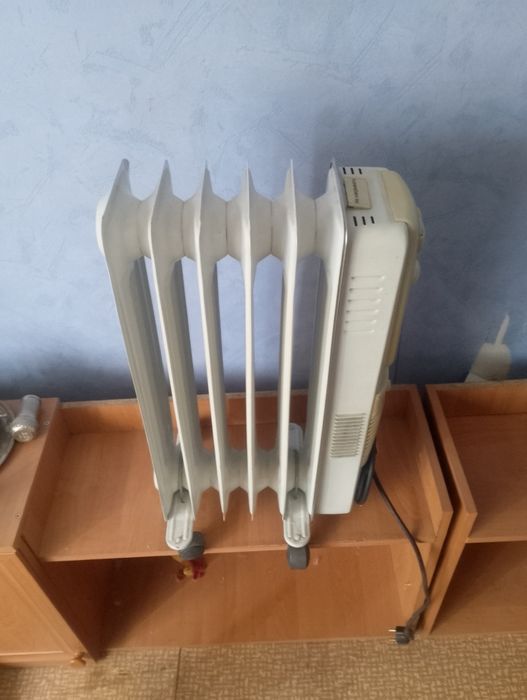 Масляний обігрівач