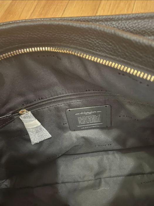 Mala coach nova com saco e alca