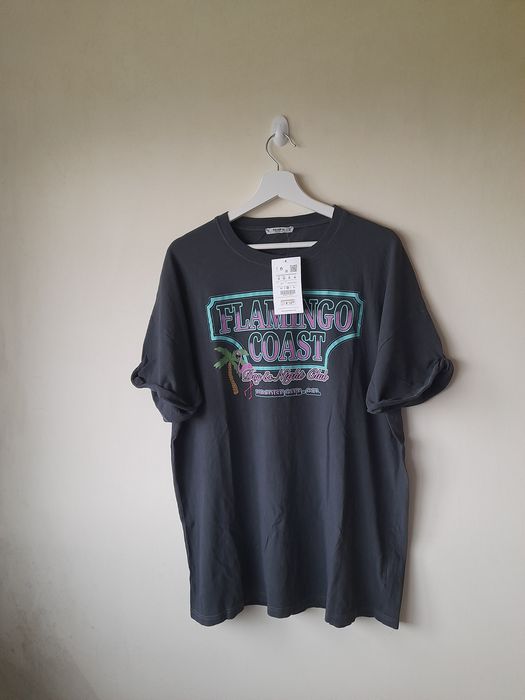 T shirt pull nova com etiquetas