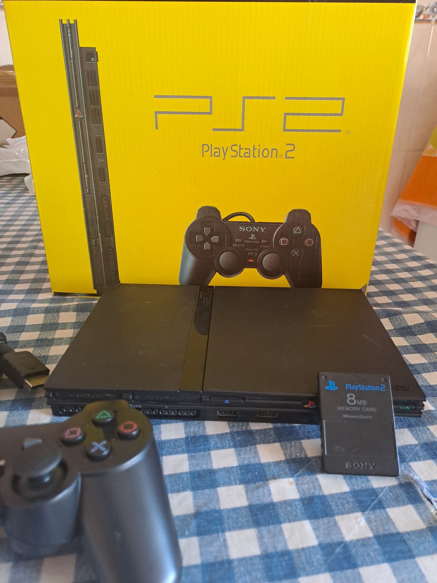 Ps2 slim com caixa