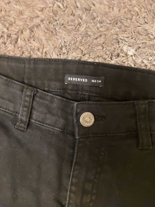 Czarne spodnie rurki jeansowe Reserved rozm. S
