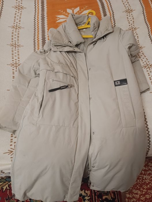 Зимний пуховик.Состояние новое