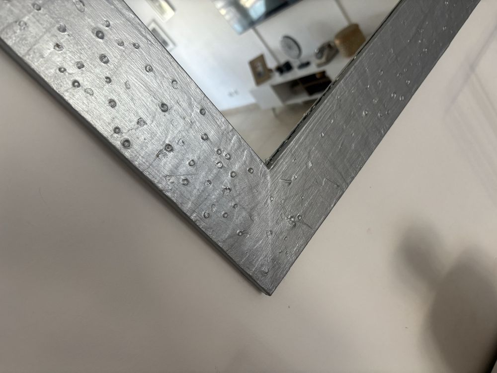 Espelho com pintura prateada