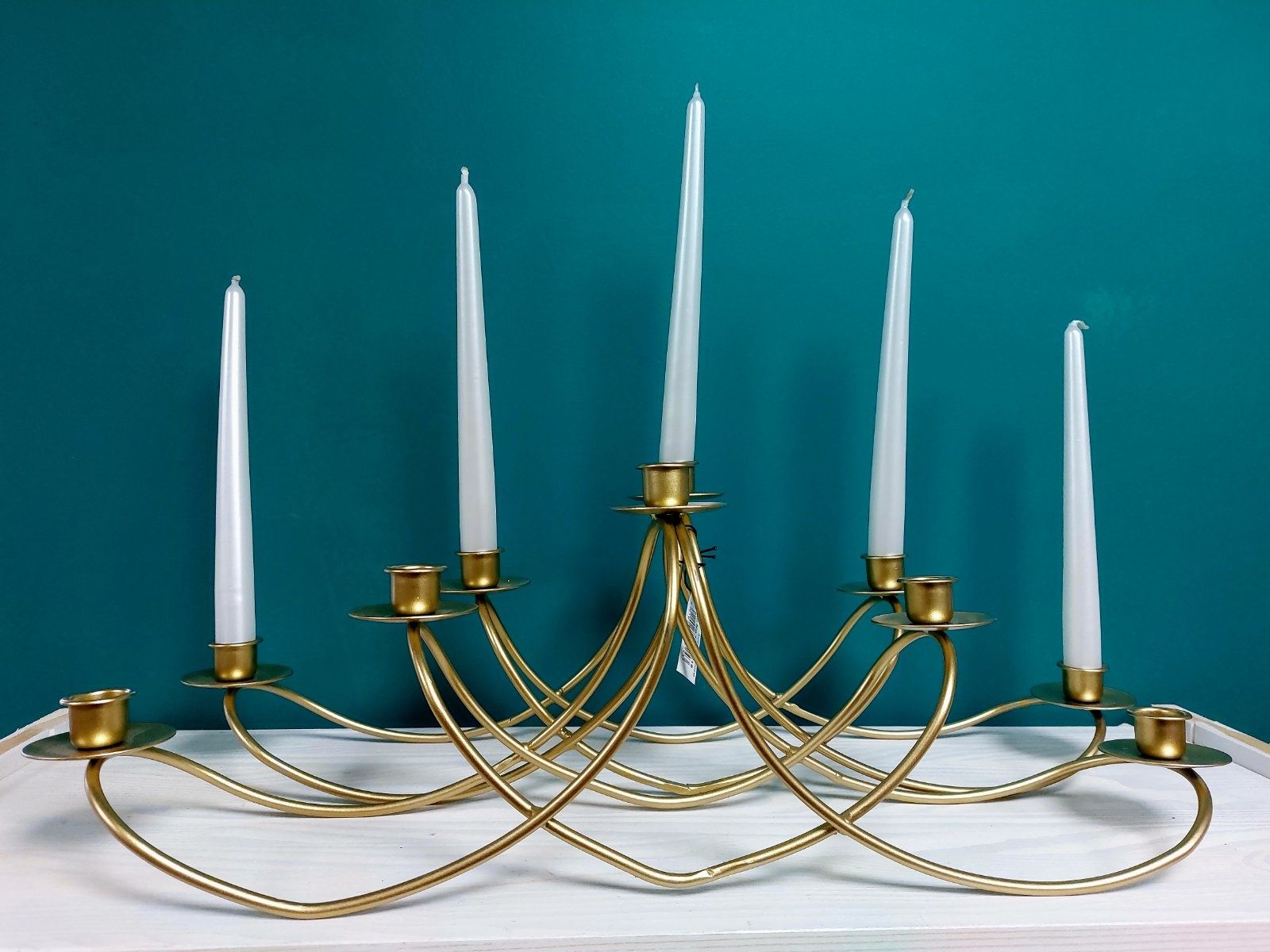 Підсвічник металевий золотистого кольору на 5 свічок