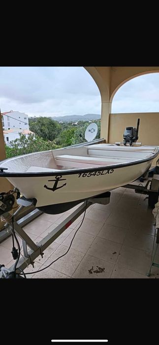 Barco com motor suzuki 15cv