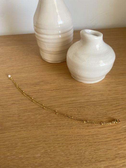 Pulseira dupla dourada