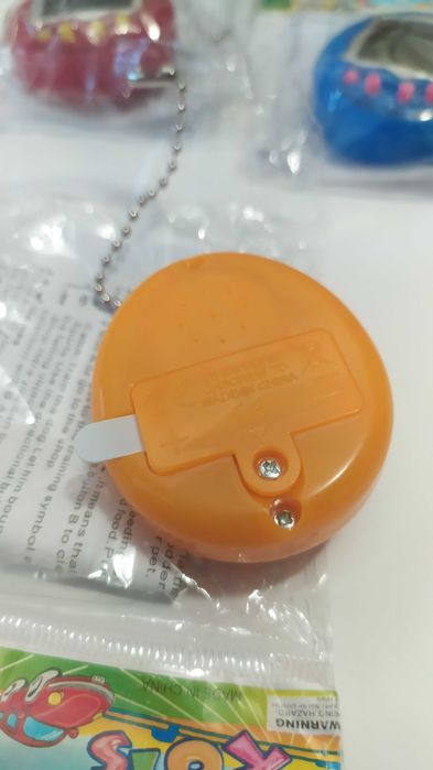 Іграшка тамагочі tamagochi ностальгія брелок 90х
