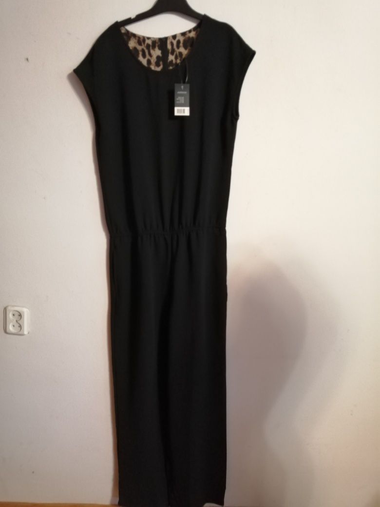 Elegancki kombinezon damski 40 /42 mowy