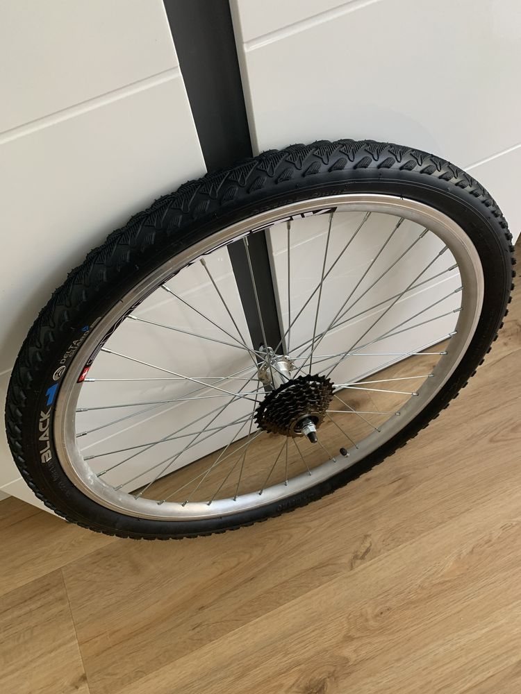 Koło rowerowe 26” tył wolnobieg 7-rz opona 26x1,90 antyprzebicie dętka