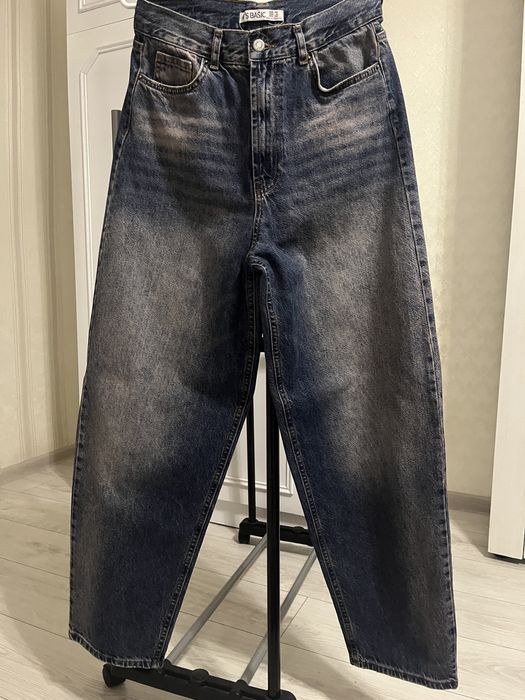 джинси з рожевим відтінком