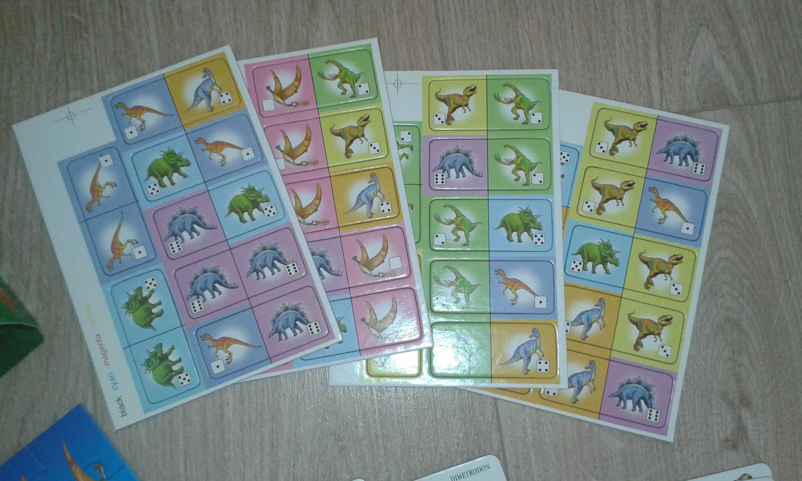Dinozaury 4 gry Domino Karty Piotruś Gra Memory Puzzle Kolorowanka