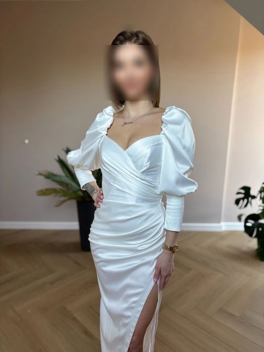 Elegancka sukienka z bufiastymi rękawami