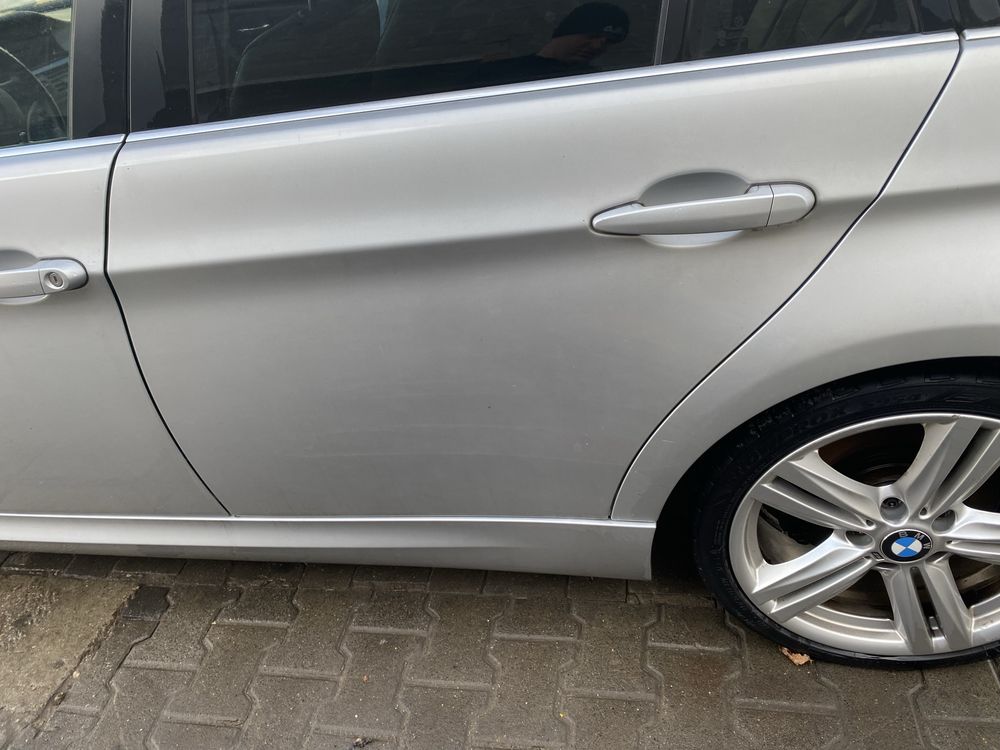 Drzwi lewe przód tył srebrne 354 europa demontaz BMW e90 e91 ori