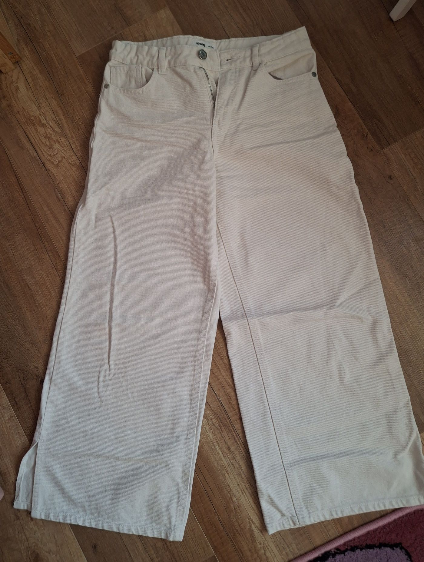 Spodnie jeansowe białe dzwony szerokie 146 cm