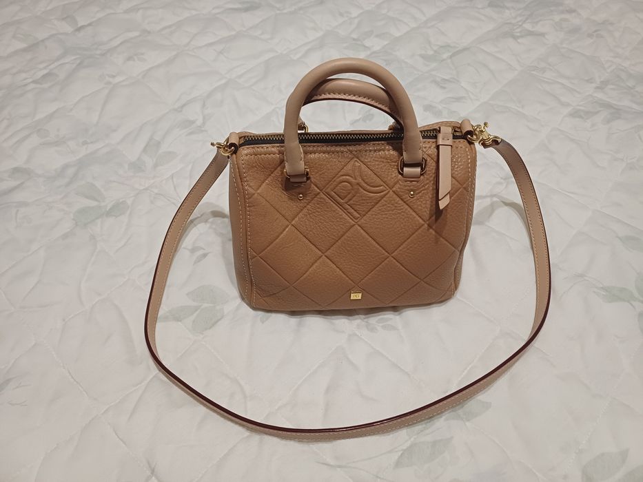 Mala, carteira nova Purificación García