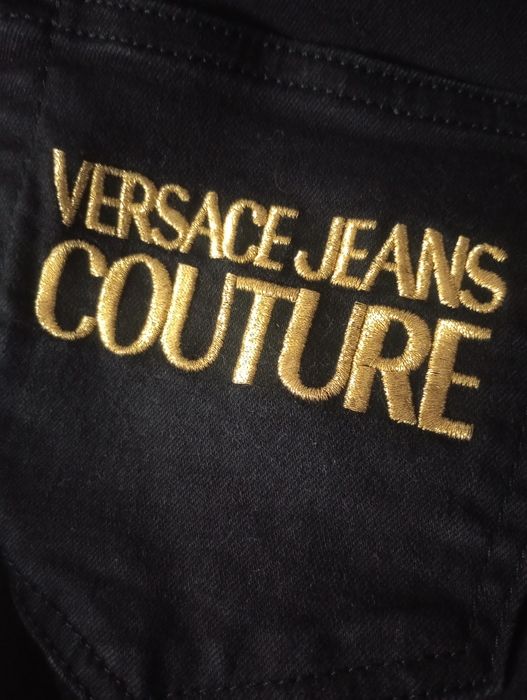 Spodnie czarne jeansowe Versace