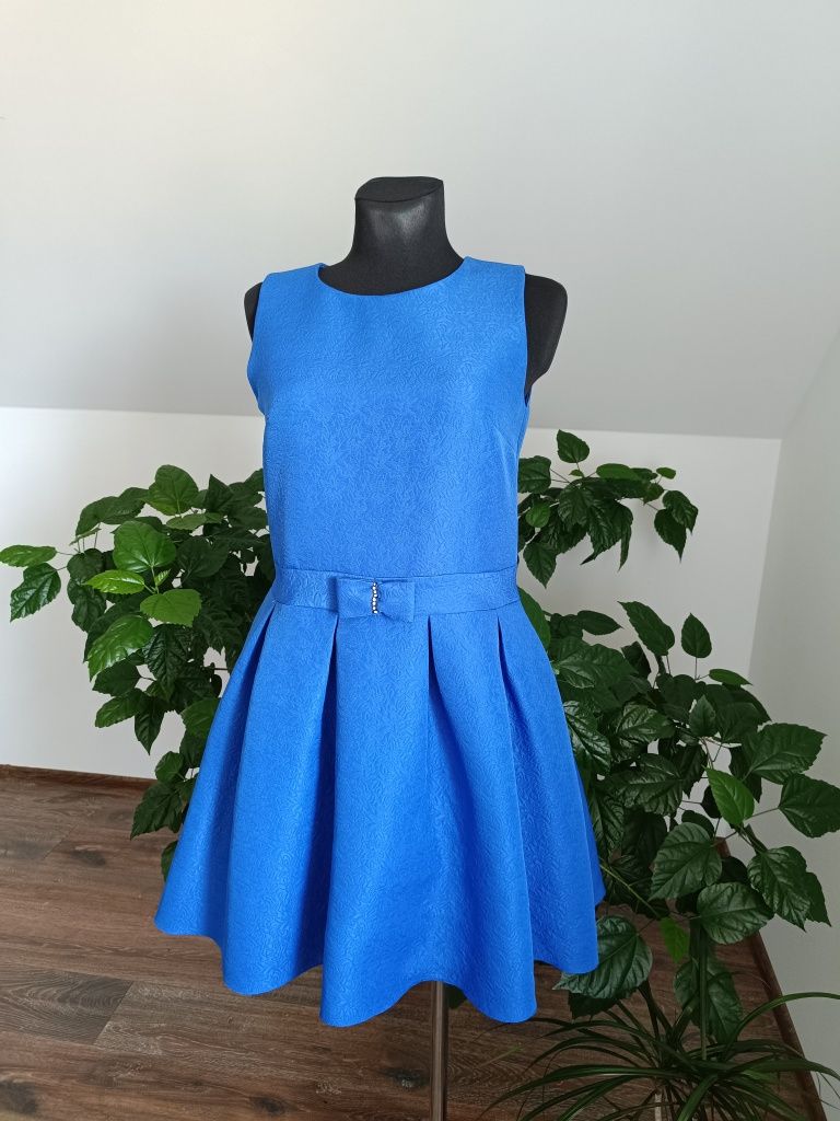 śliczna niebieska rozkloszowana sukienka L 40 zamek na plecach