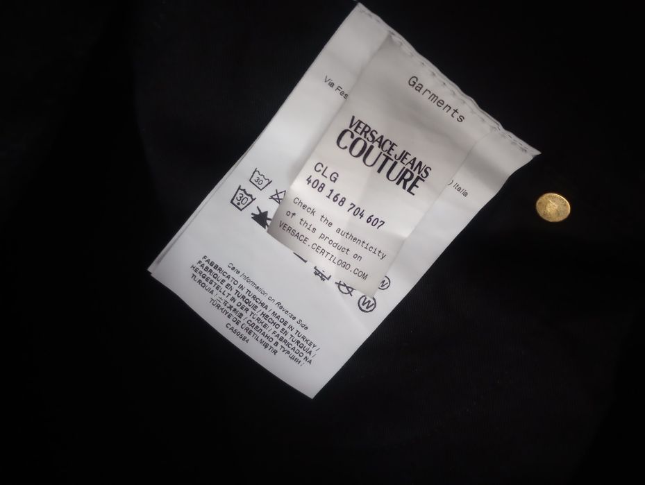 Spodnie czarne jeansowe Versace