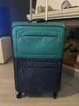 Mala de viagem de marca Pack it com a cor azul/verde a