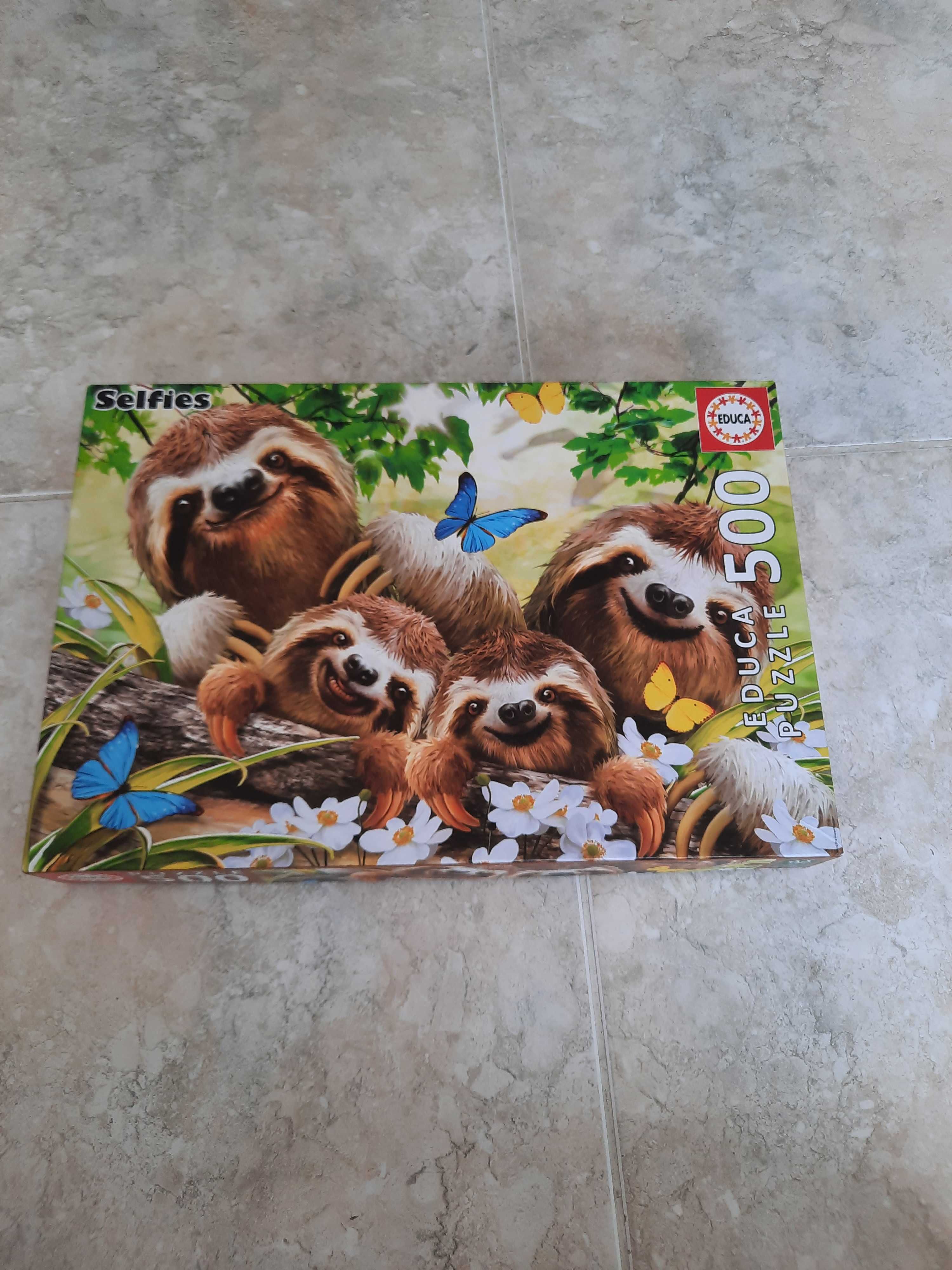 2 puzzles semi-novos 500 peças