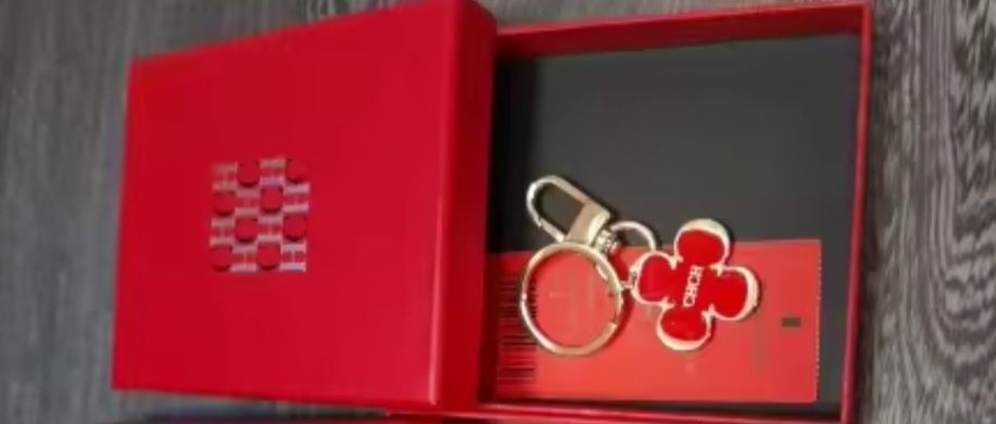 Porta chaves carolina herrera / para malas