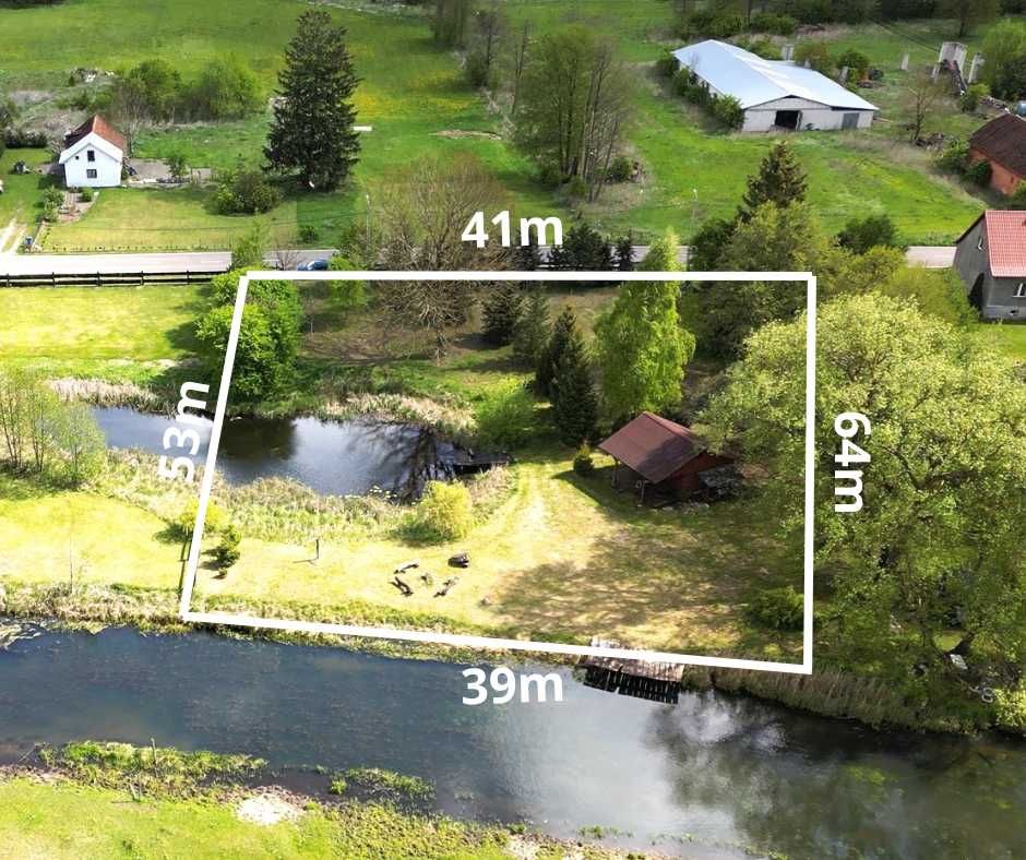 Działka 2300 m² z linią brzegową rzeki na Mazurach