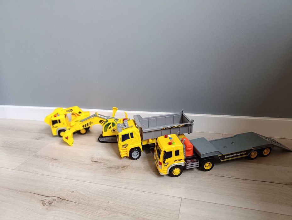 Pojazdy budowlane koparka laweta wywrotka