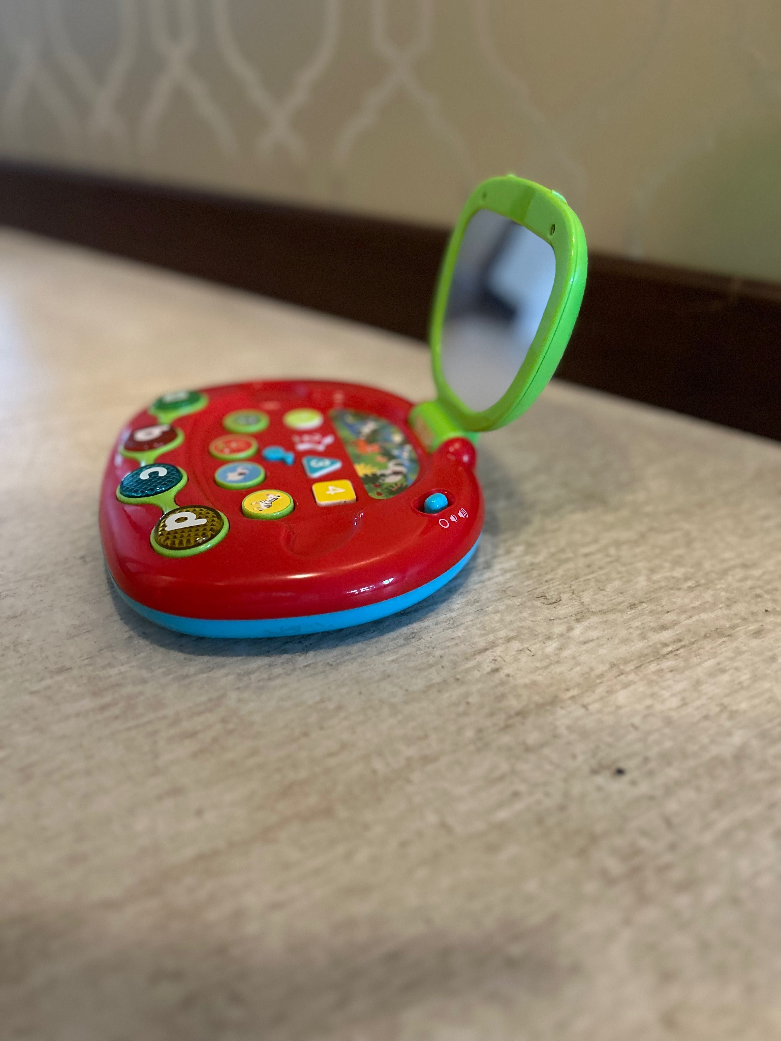 Laptop Carousel zabawka edukacyjna dla dziecka od 12 ms
