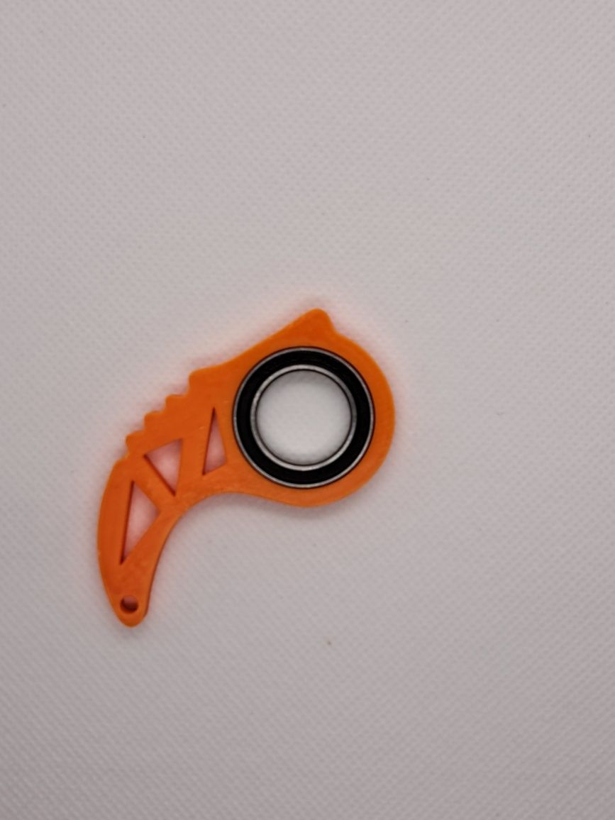 Keyrambit fidget spinner Flexi Dino TikTok 100% wypełnienia