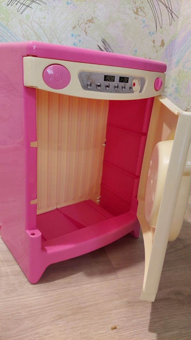 Іграшкова пральна машинка рожевого кольору