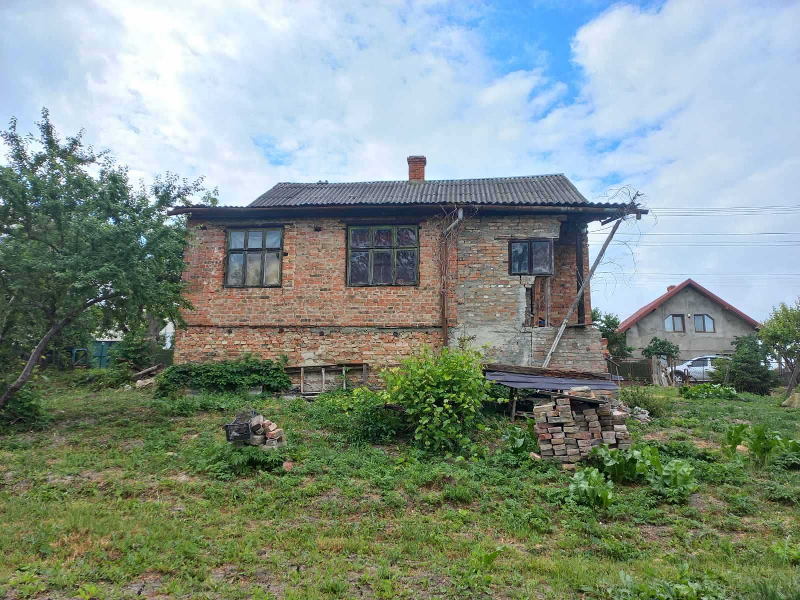 Житловий будинок та земельна ділянка 12 сот., м. Кам'янка-Бузька