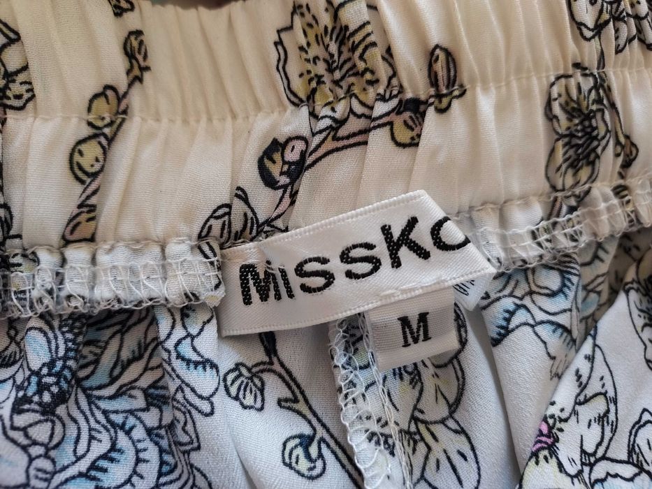 Calças estampadas brancas com bolsos