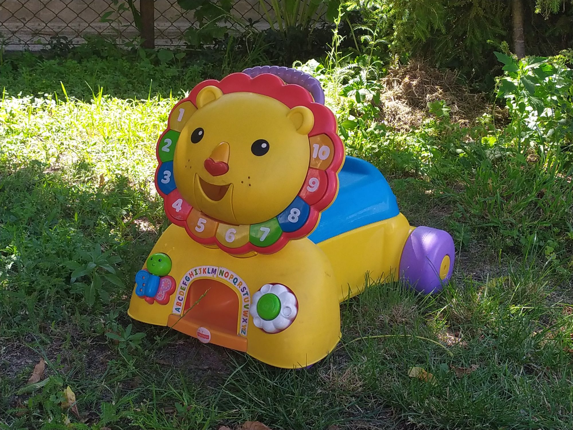 Pchacz jeździk chodzik interaktywny lew