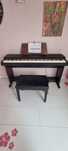Pianino cyfrowe Roland HP-800 z regulowana ławą