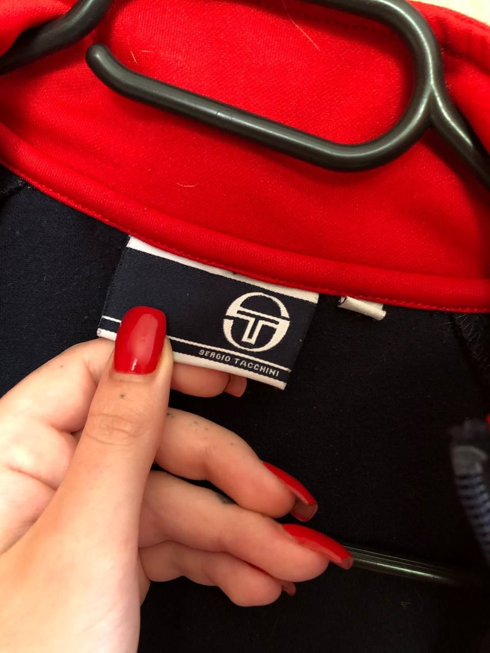 Зіпка Sergio Tacchini
