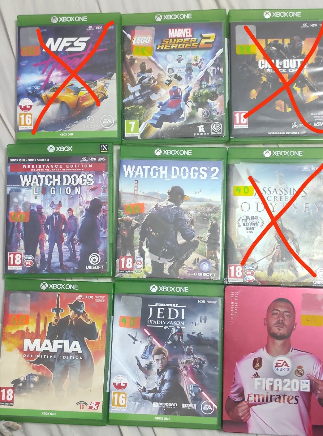 Sprzedam gry na Xbox ceny na pudełkach