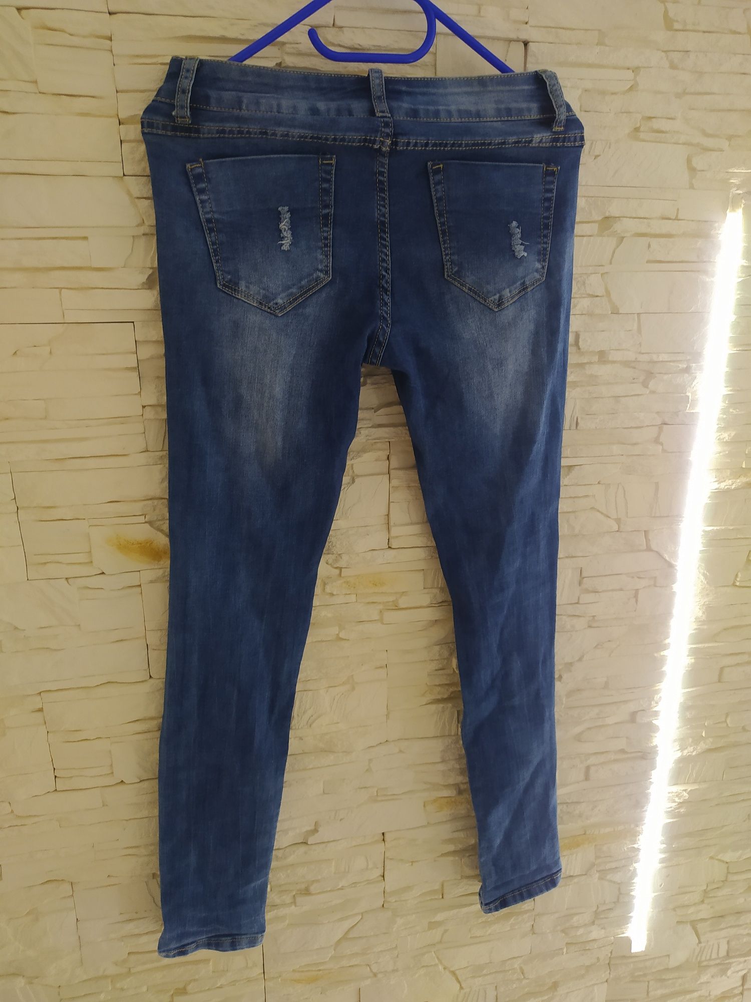 Spodnie jeans 38