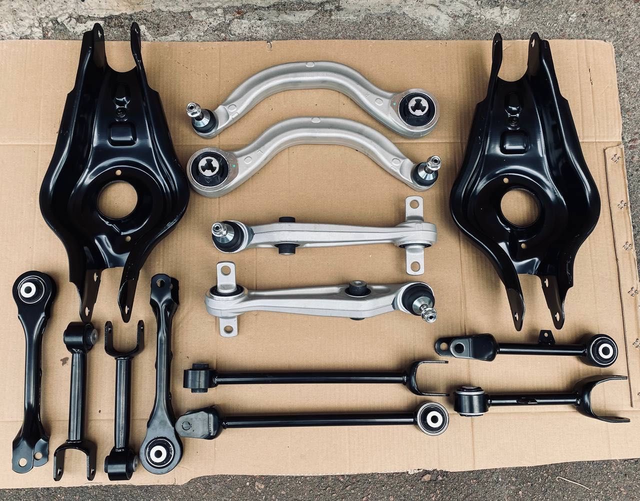 Рычаг подкова нового образца Tesla model Y 1188321-00-A 1188326-00-A