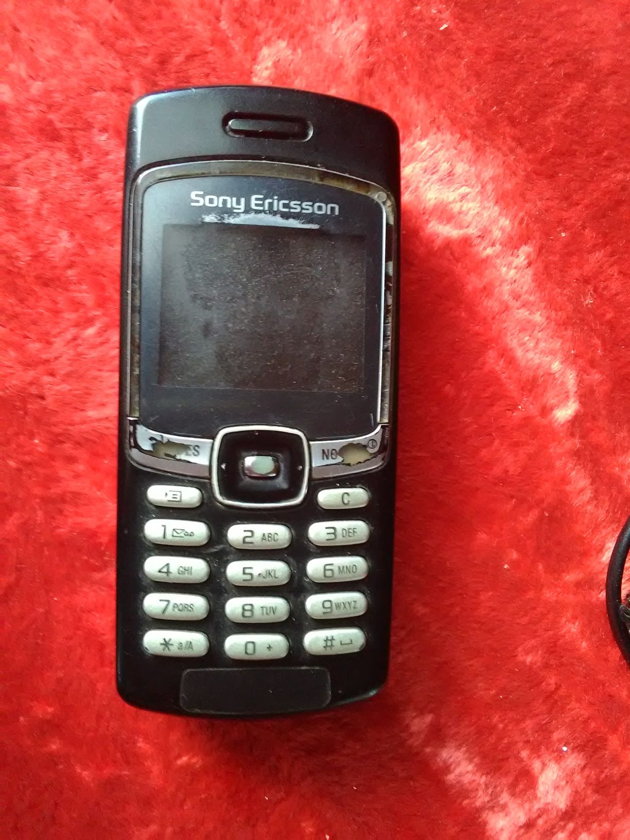 Мобильный Sony Ericsson. Зарядка.