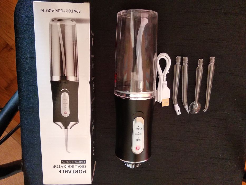 Иригатор портативный для полости рта.