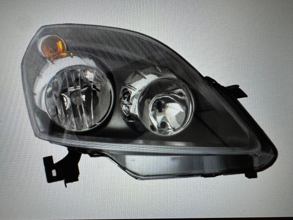 Opel Zafira B reflektor przód maska inne